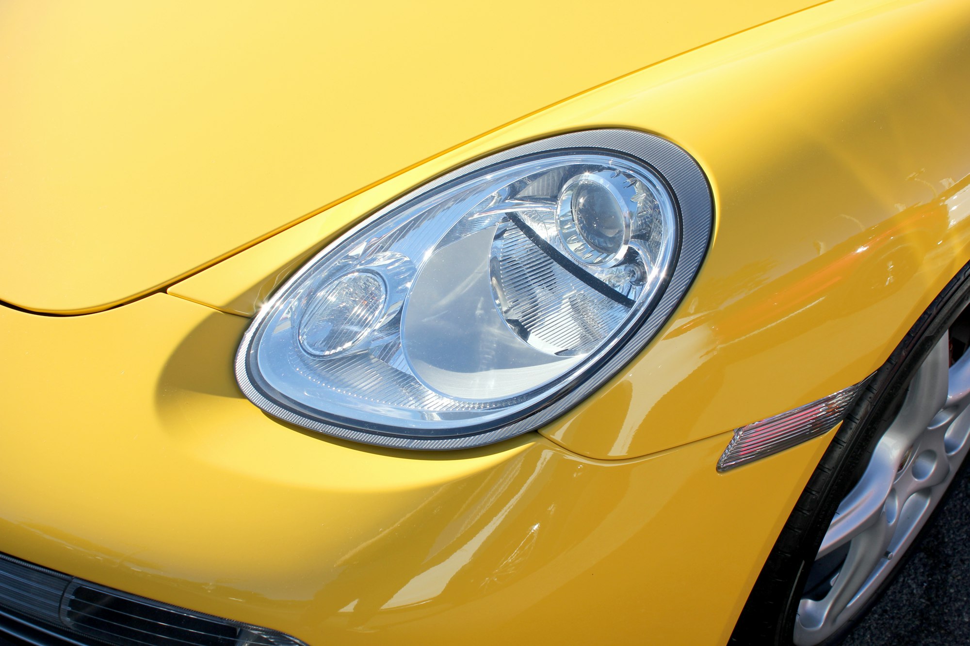 Yellow car headlight - Porsche Boxter S